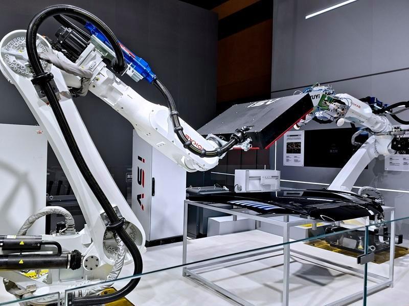 关键工序100%自动化!济宁造机器人上岗赛力斯动力长寿工厂